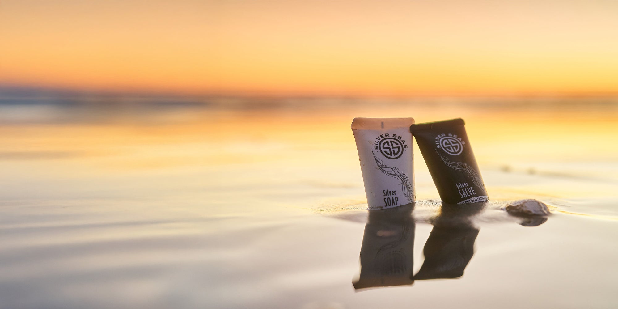 Silver Seas Soap and Salve Microsilver BG™ sticking out of beach sand.